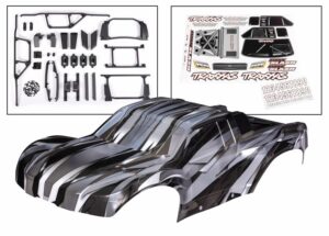traxxas body, maxx slash, prographix (graphics are printed, requires paint & final color application)/ decal sheet (includes body support, body plastics, latches, & hardware for clipless mounting) trx10211x