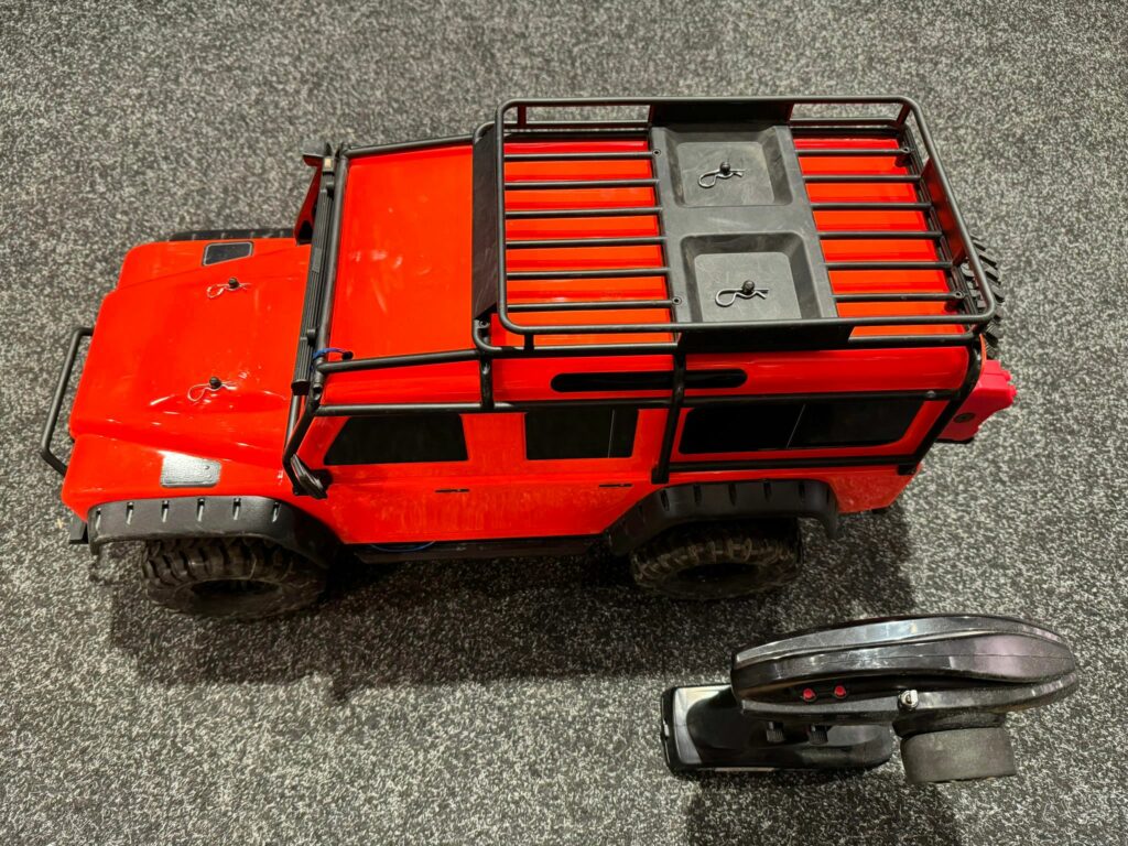 traxxas trx 4 land rover defender rtr 2.4ghz in de kleur oranje met traxxas led set in een top staat met garantie!