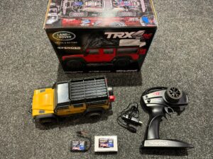 traxxas trx 4m 1/18 scale and trail crawler land rover 4wd electric truck geleverd met 2e accu in een top staat!