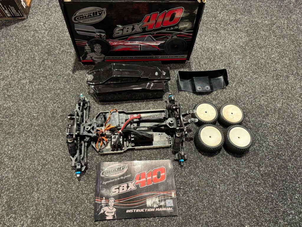 team corally sbx 410 racing buggy kit + brushless motor + brushless regelaar + servo (gebruikt maar in orde)!