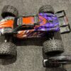 traxxas e revo 2 brushless monster truck rtr tsm 2.4ghz in de kleur paas/oranje in een goede staat met 1 jaar garantie!