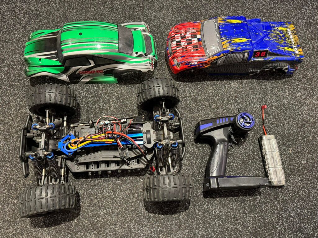 himoto (hobbywing brushless motor en regelaar) 4wd monster truck met 2e body en zender!