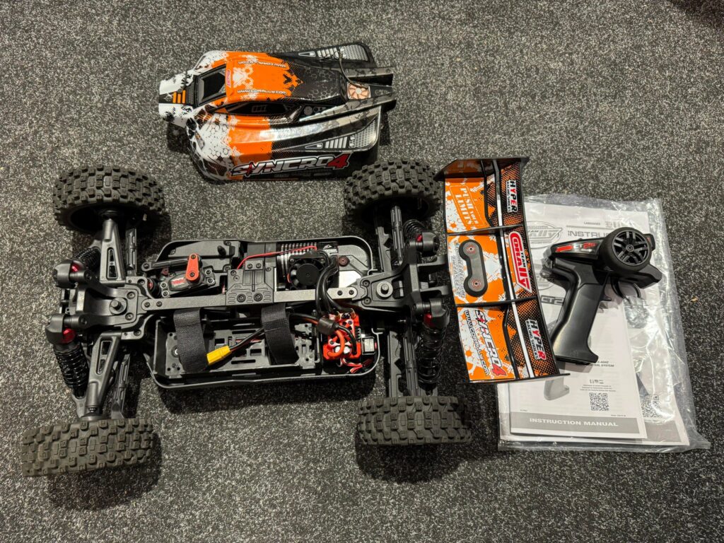 team corally syncro 4 1/8 brushless electro buggy rtr oranje in een goede staat met 1 jaar garantie!