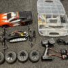 absima 1/10 4wd electro truggy compleet met 2x accu en lader met zender en onderdelen!