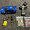 carisma gt24 subaru wrc 4wd 1/24 micro rally rtr met 2x extra set banden met velgen in een top staat!