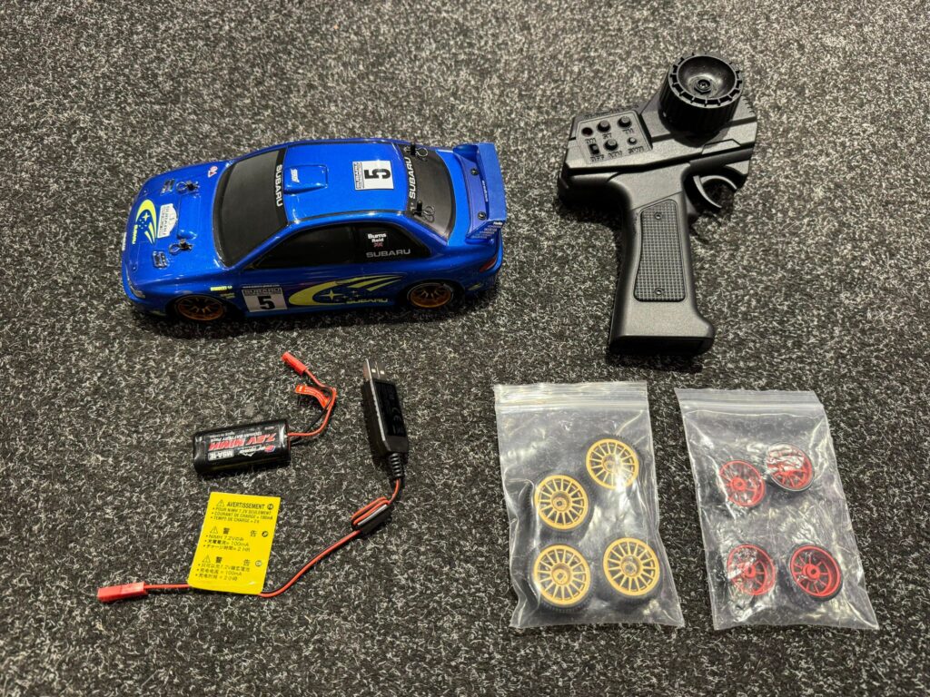 carisma gt24 subaru wrc 4wd 1/24 micro rally rtr met 2x extra set banden met velgen in een top staat!