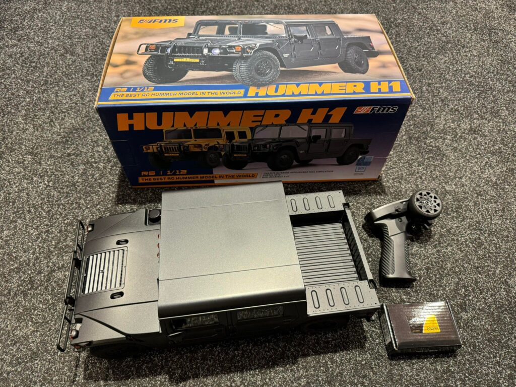 fms hummer h1 alpha 1/12 scaler rtr zwart met 2e batterij echt als nieuw met 1 jaar garantie!