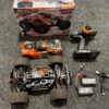 maverick atom 1/18 4wd electric monster truck oranje met 2e batterij (gebruikt)