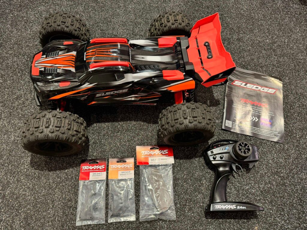 traxxas sledge 1/8 4wd brushless monster truck rtr tsm 2.4ghz met rpm bumper en wheelybar + extra onderdelen echt in een top staat!