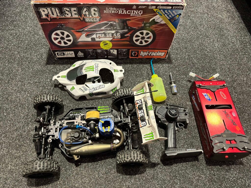 hpi pulse 4.6 nitro buggy 4wd rtr met starterbox en zender met toebehoren (gebruikt maar in een keurige staat)!