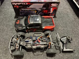 traxxas ford f 150 raptor r 4x4 1/10 scale 4wd truck tqi tsm 2.4ghz met luxe tuning dempers (gebruikt)!