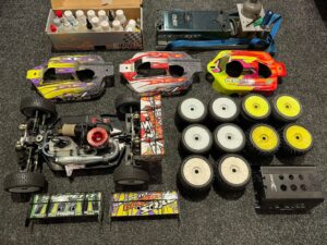 serpent srx8 nitro 1/8 wedstrijd buggy + rc4 transponder + futaba ontvanger + extra bodies + extra banden + een hele tas met onderdelen (complete hobby!