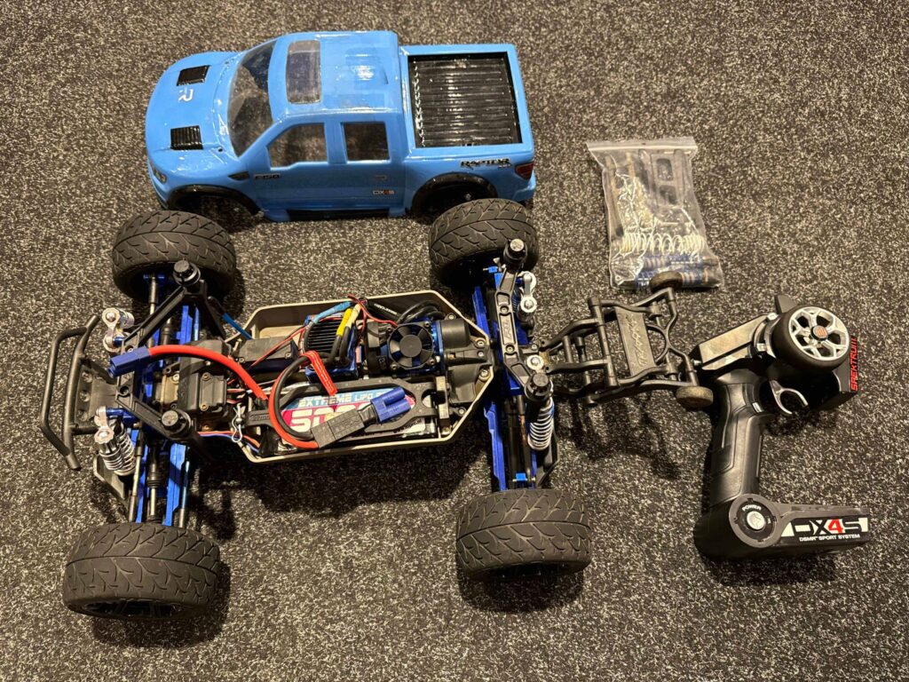 traxxas stampede 4x4 vxl monster truck rtr met luxe spektrum dx4s zender en zeer veel tuning onderdelen (gebruikt)!