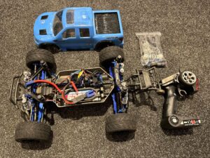 traxxas stampede 4x4 vxl monster truck rtr met luxe spektrum dx4s zender en zeer veel tuning onderdelen (gebruikt)!