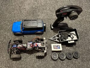 traxxas trx 4m 1/18 scale and trail crawler ford bronco 4wd electric truck + 2e traxxas batterij + traxxas aanhanger + 2e set banden + tuning onderdelen!