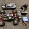 traxxas e revo 1/16 brushed monster truck rtr 2.4ghz met absima zender en 2x maxxtrax 2000mah 2s lipo batterijen (in een nette staat)!