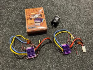 2x novak rooster crawler edition brushed esc + 1x novak 55t crawler motor (nieuwwaarde €250)!