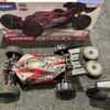 arrma 1/8 typhon 6s blx v5 4wd buggy spektrum firma rtr + aluminium bulkhead achter + dubbele coolingfan + schoepenbanden (gebruikt in een nette staat)!