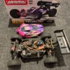 arrma tlr tuned typhon 1/8 race buggy 4wd roller pink/purple + spektrum 150a regelaar en motor + spektrum metalen servo + coolingfan (zonder zender)!