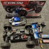 team corally syncro 4 1/8 brushless electro buggy rtr blauw echt als nieuw compleet met 2x 3s 5000/5200mah lipo batterijen!