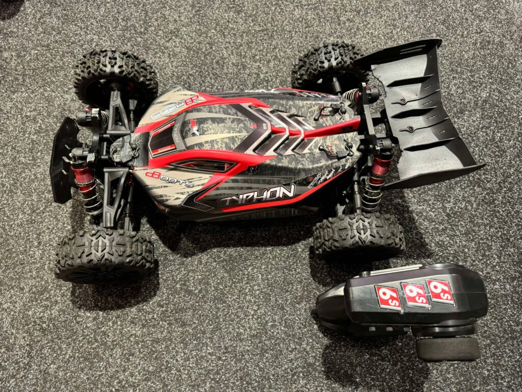 arrma 1/8 typhon 6s blx v5 4wd buggy spektrum firma rtr zwart (gebruikt)!