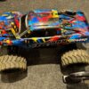 traxxas x maxx 8s brushless monster truck rtr rock en roll met louise banden (gebruikt maar in orde)!